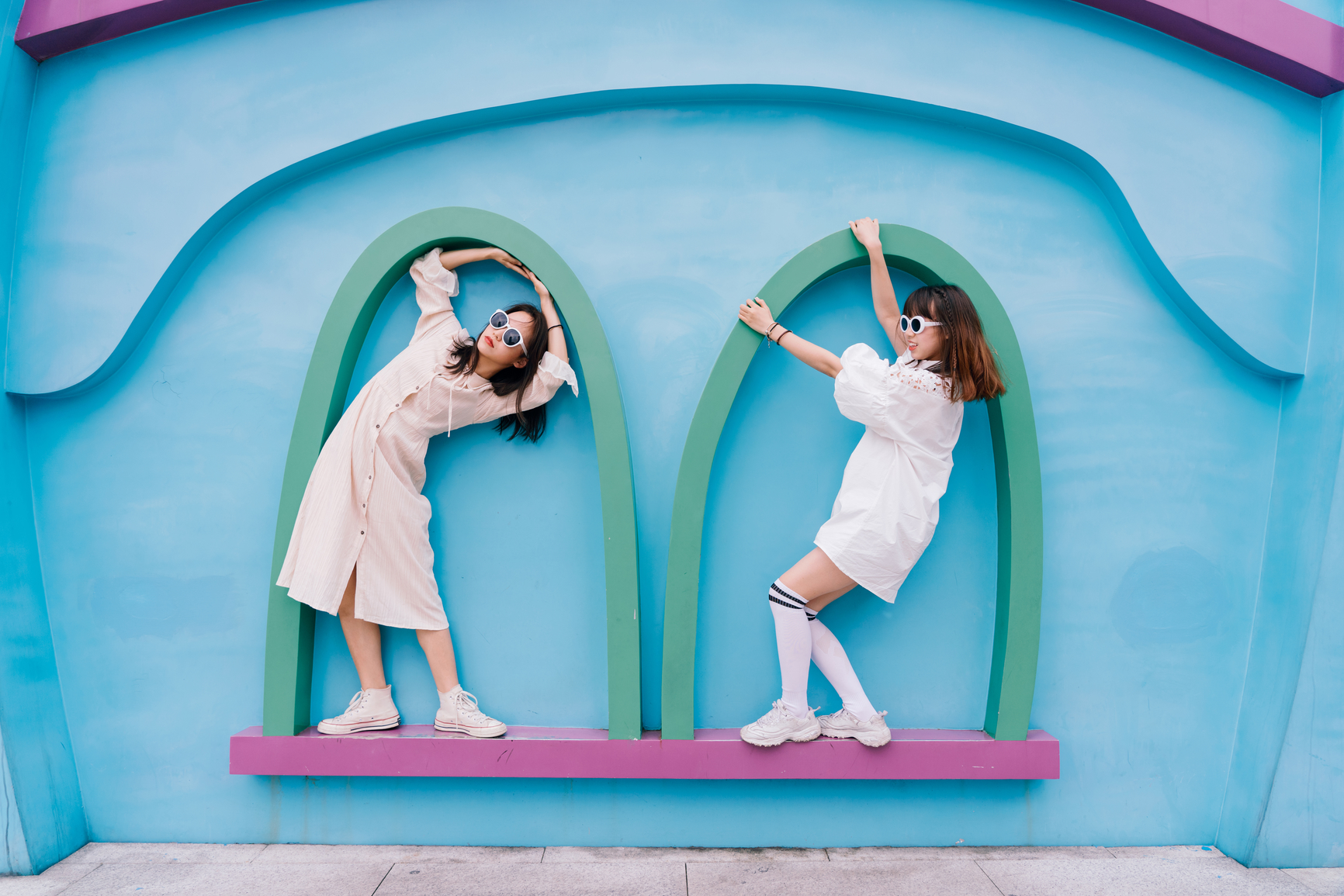 funny portrait of two fashionable women